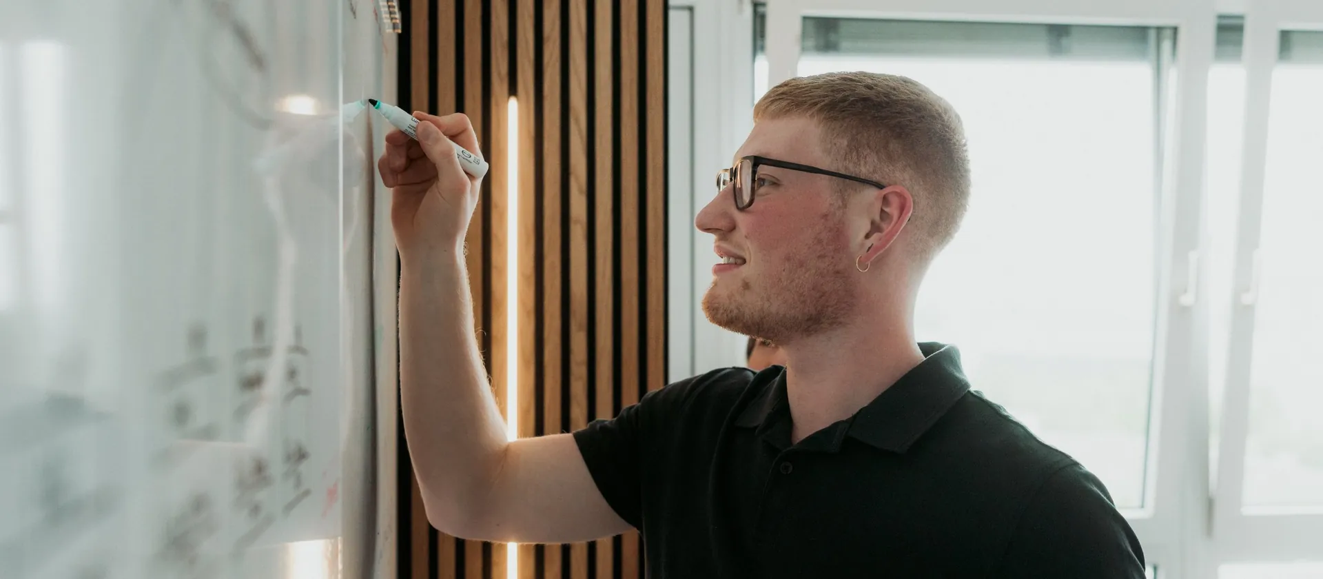 Martin Moosburger sketching an idea on a whiteboard